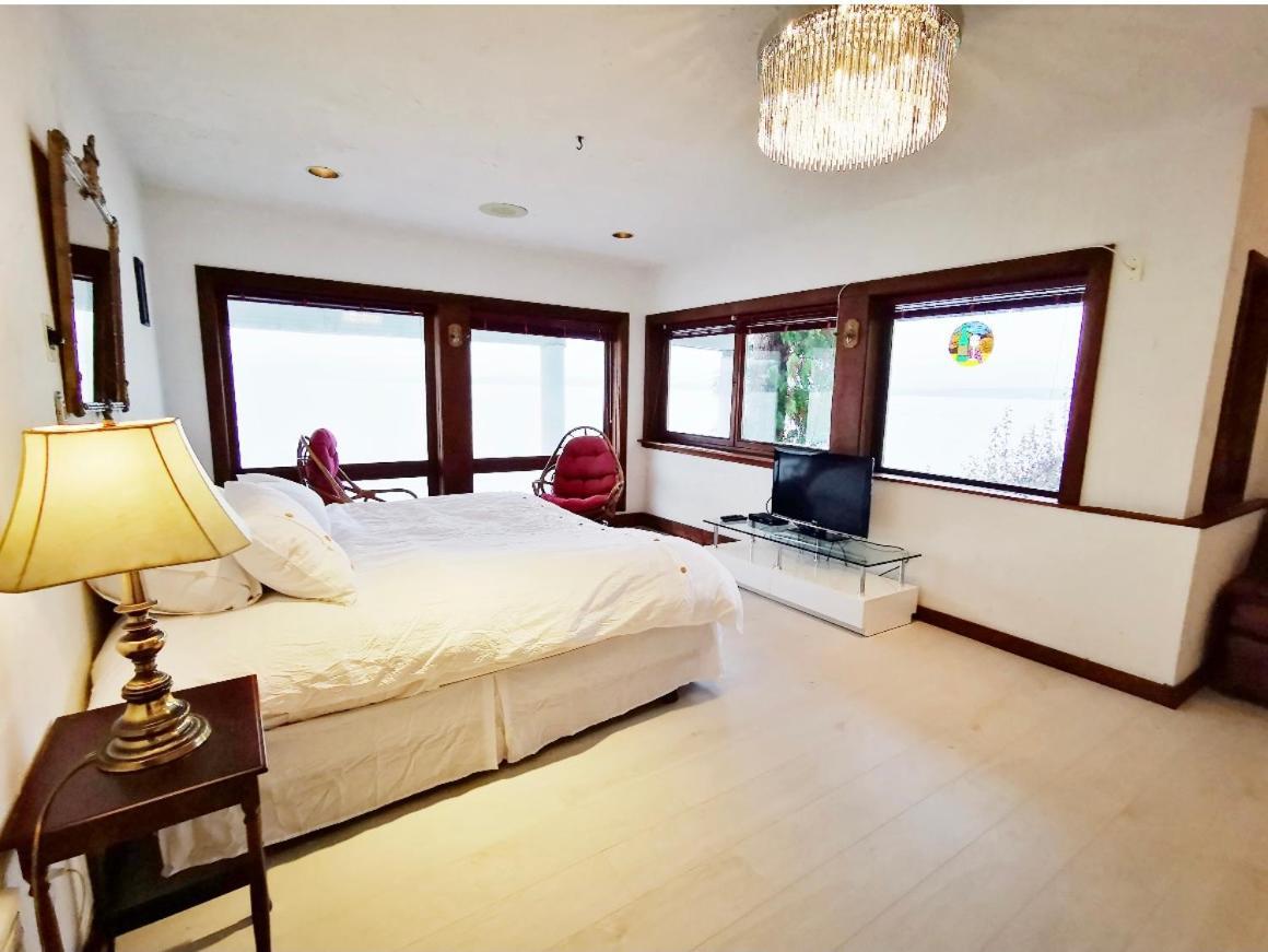 Walkon Waterfront Castle Cove Inn 彻梅纳斯 外观 照片